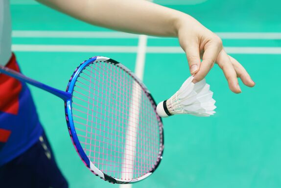 woman-holding-a-badminton-racket-ready-to-hit-shut-2022-04-08-12-50-09-utc-1.jpg